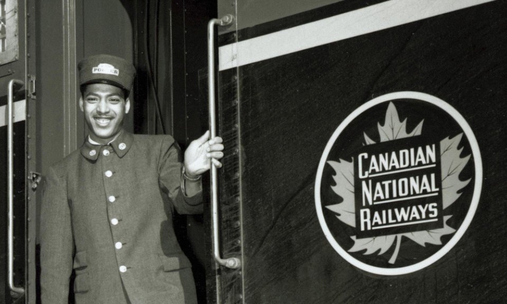 A screenshot from the film The Road Taken of a Black sleeping-car porter in the early-to-mid 20th Century.