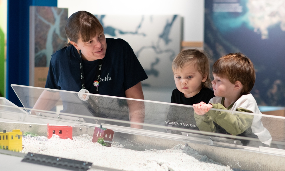 Delta staff interacts with young Discovery Centre visitors.