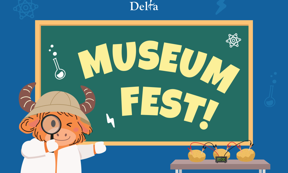 The Yak stands in front of a chalk boards that says MUSEUM FEST on it. 