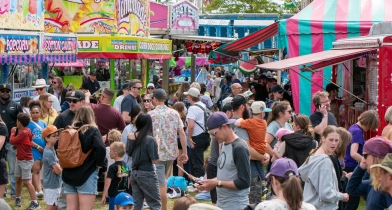 Crowds gather at the booths at the 2025 May Days.