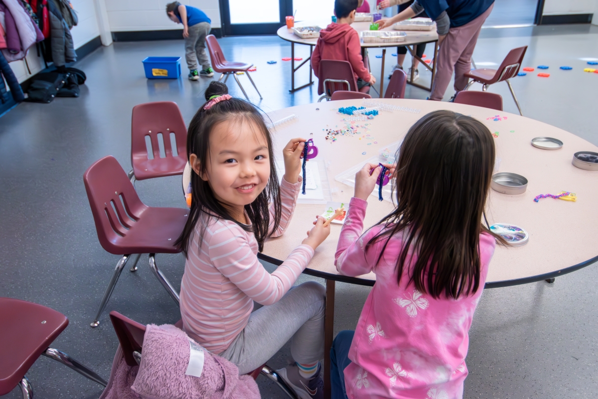 A student smiles at a community recreation class.