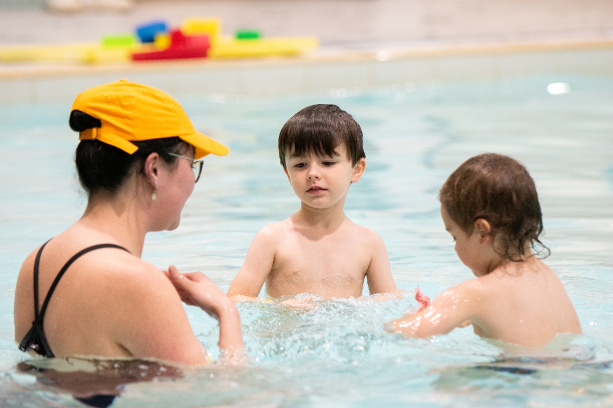 Two students start their lessons in the Winskill teach pool.