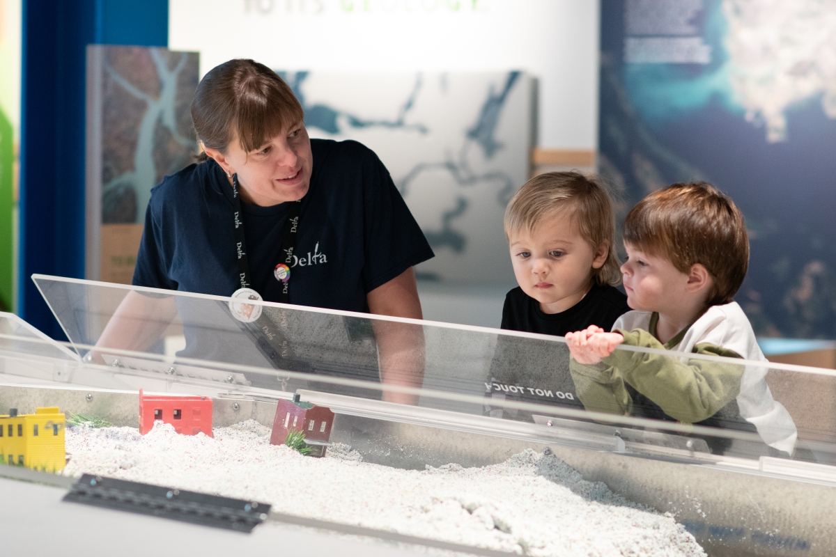 Delta staff interacts with young Discovery Centre visitors.