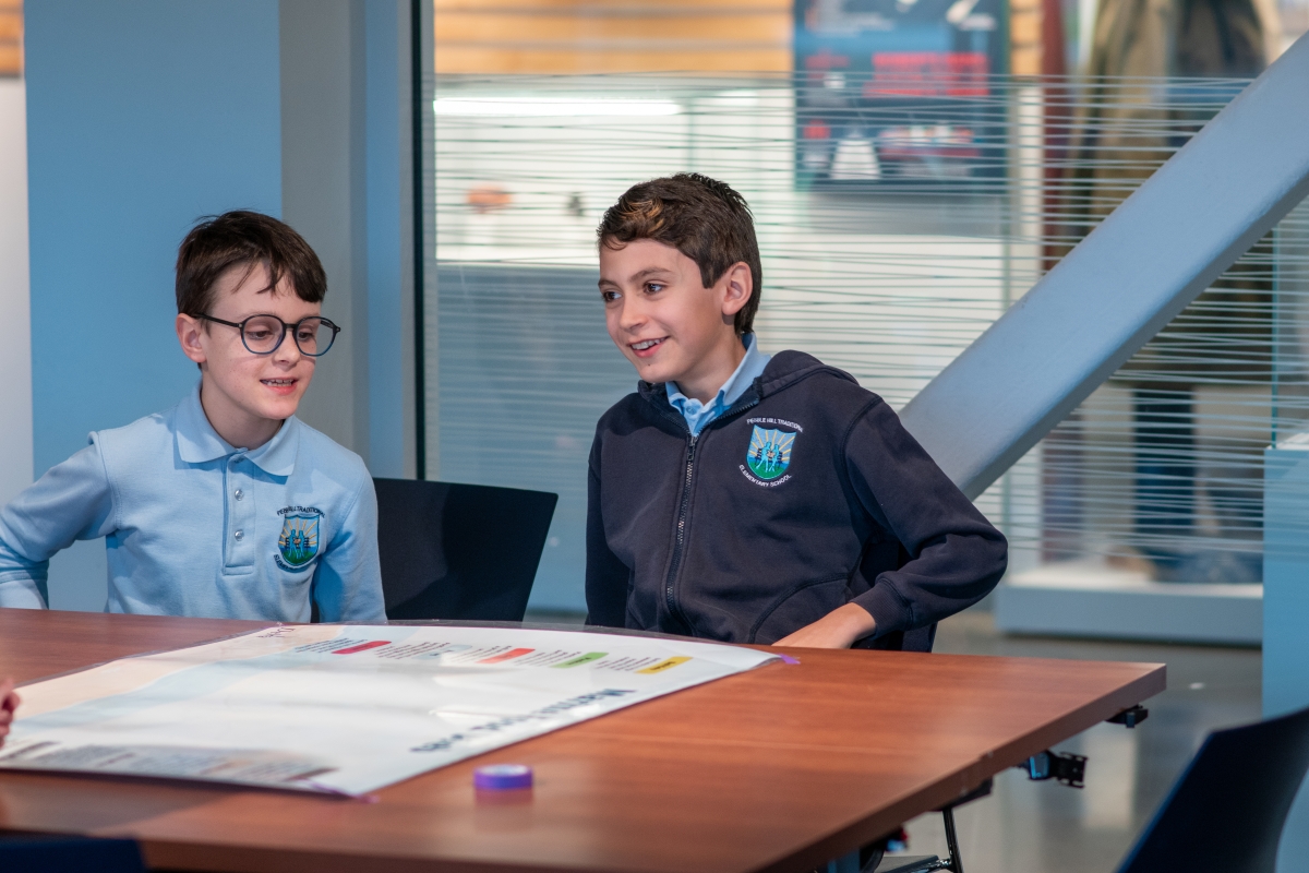 Students happily engage at the Delta Archives.