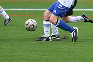 Shot of soccer players about to kick a soccer ball