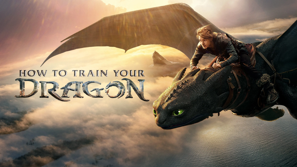 Toothless flies through the sky on the How to Train Your Dragon banner. 