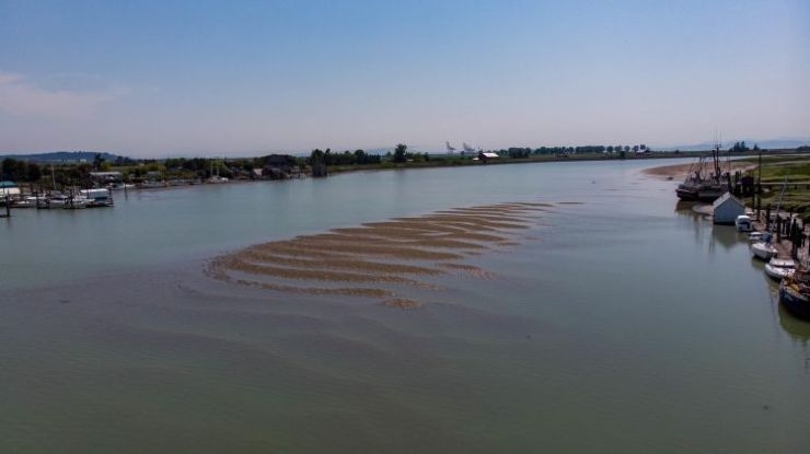 fishing boat stuck on sediment build-up