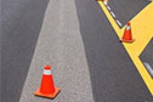 highway painting with orange cones