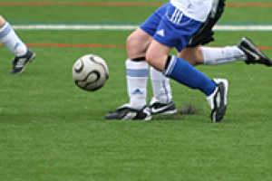 Shot of soccer players about to kick a soccer ball