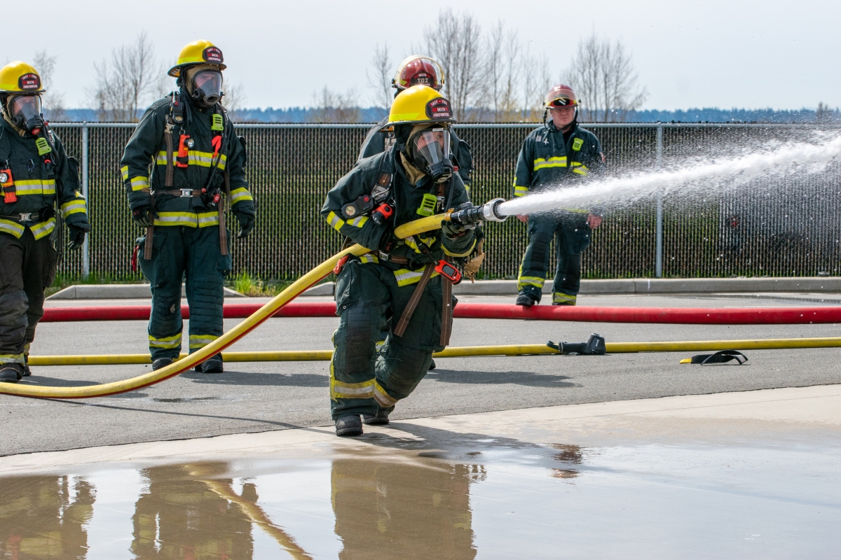 Firefighter with hose